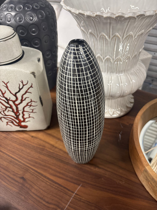 Skinny black and white vase