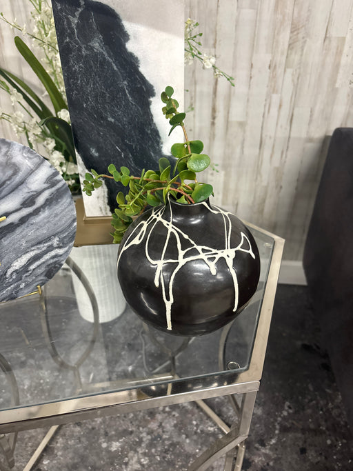 Black Decor with Greenery