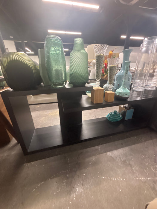 Black wooden console table from Clive Daniel