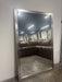 Large silver framed mirror
