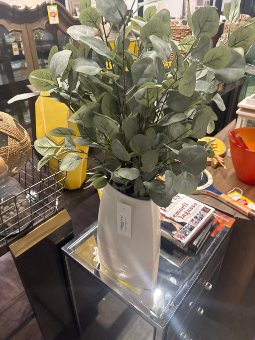White vase with plants