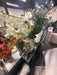 Orchids with glass vase