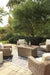 Beachcroft Beachcroft Fire Pit Table with Four Nuvella Swivel Lounge Chairs - Abundant Home Collections